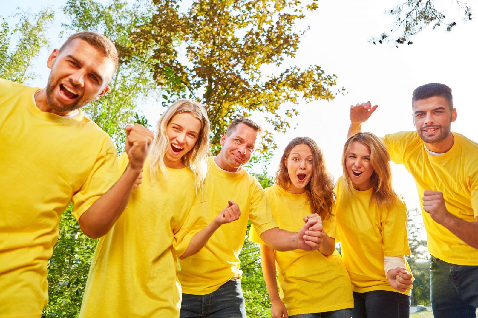 Happy,Team,Celebrates,Success,At,Teambuilding,Event,In,Nature
